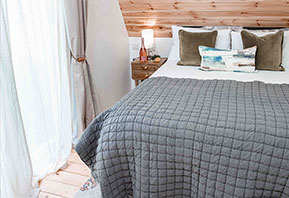 Glamping cabin bedroom Suffolk