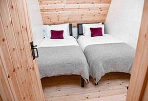 Glamping cabin bedroom Suffolk