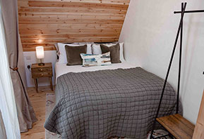 Glamping cabin bedroom Suffolk