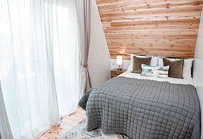 Glamping cabin bedroom Suffolk