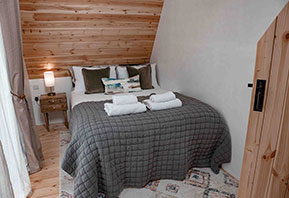 Glamping cabin bedroom Suffolk