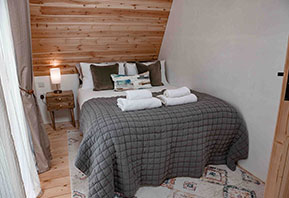 Glamping cabin bedroom Suffolk